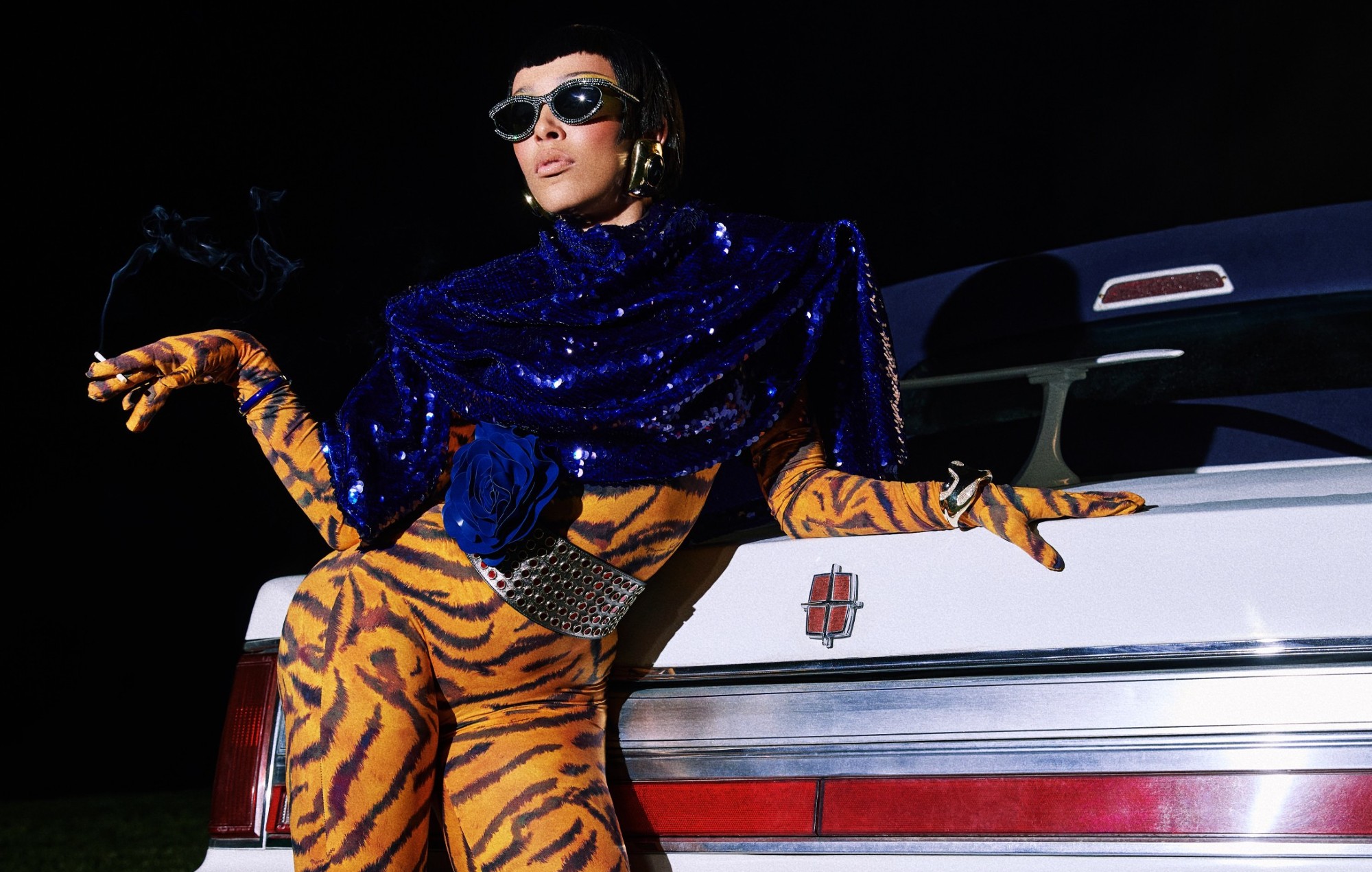 Глядзіце Doja Cat Sing "раўнівы тып" у "80-х гадах" VMAS з дапамогай Kenny G