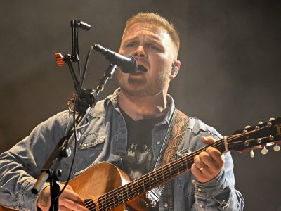 Зак Браян апранае кашулю з надпісам “Вольная Палестына” на стадыёне Gillette пасля сваркі Роберта Крафта і Маклмара